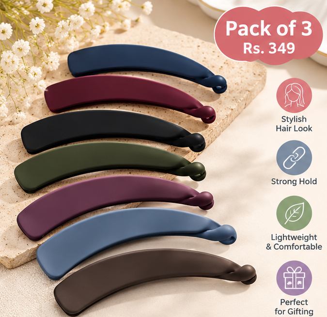 Banana hair clips in assorted colors arranged on a neutral aesthetic display