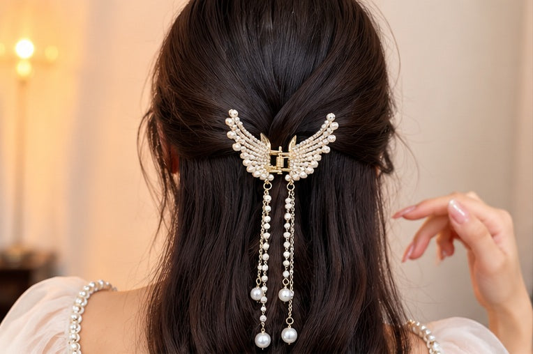 Butterfly pearl chain hair catcher worn in hair, lifestyle view